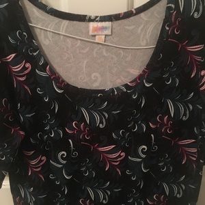 Black background Lularoe Nicole dress